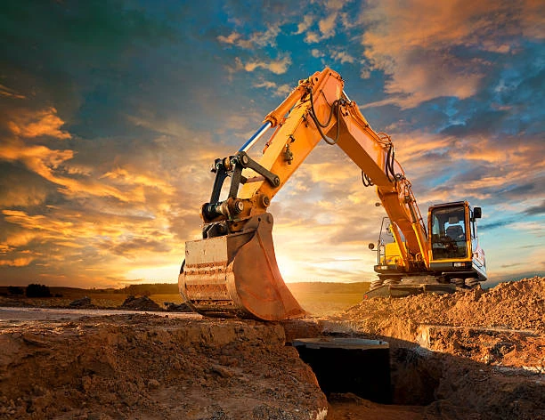 Hình ảnh máy xúc đang hoạt động tại một công trường xây dựng